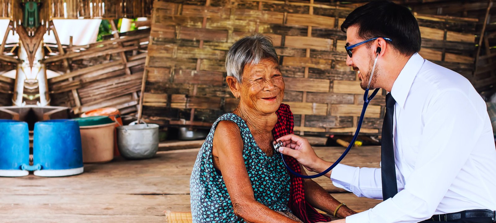 smiling senior woman with her doctor