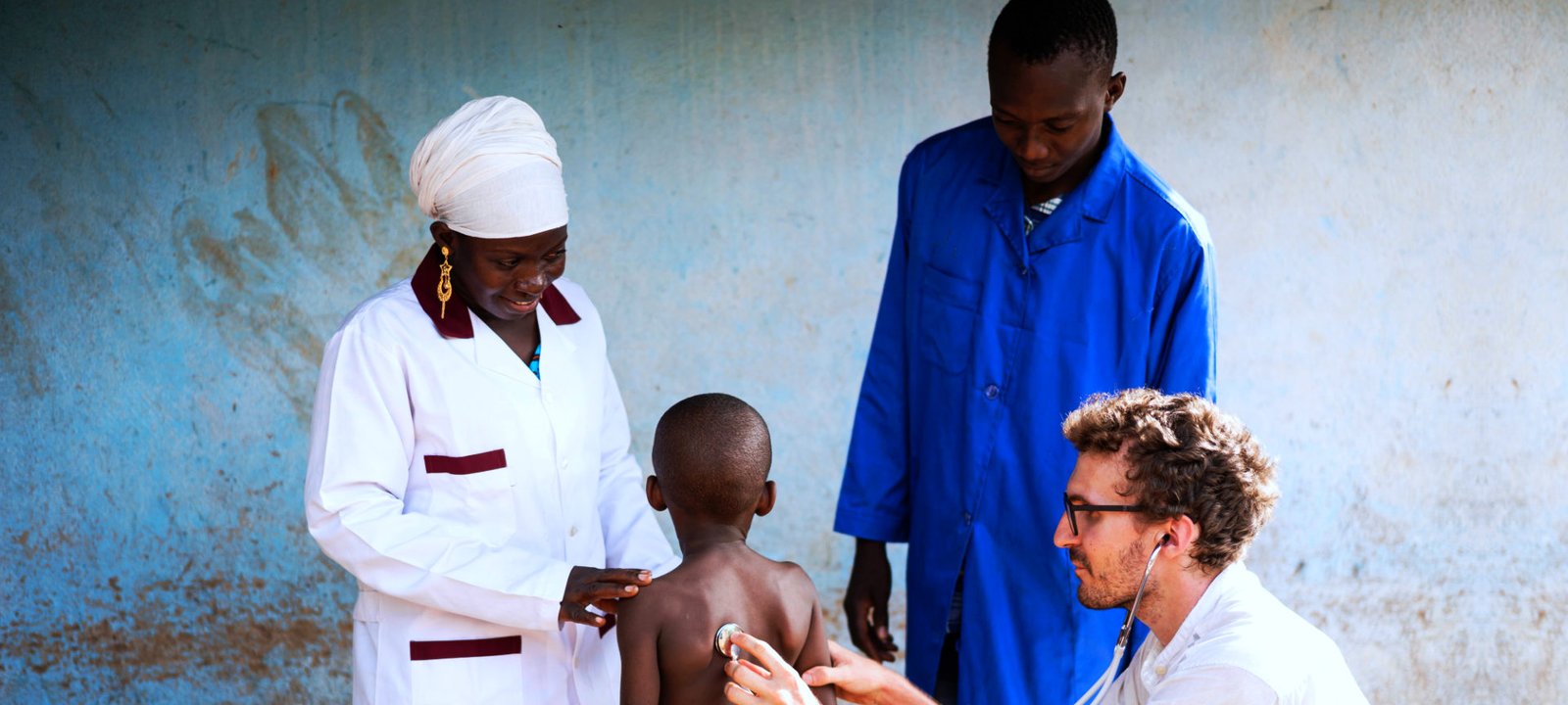 doctor checking up to his clients